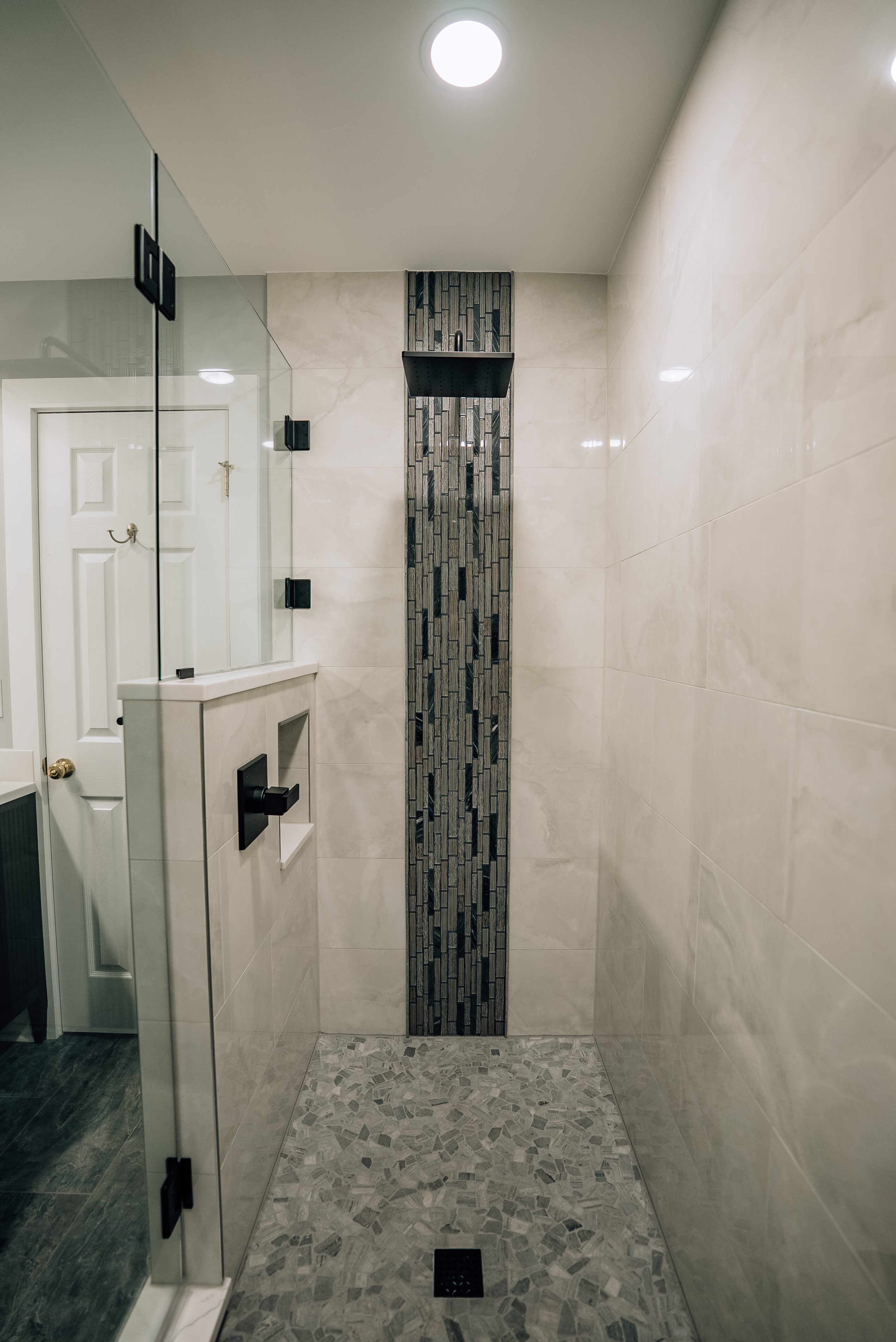 Shower with Vertical Mosaic Accent